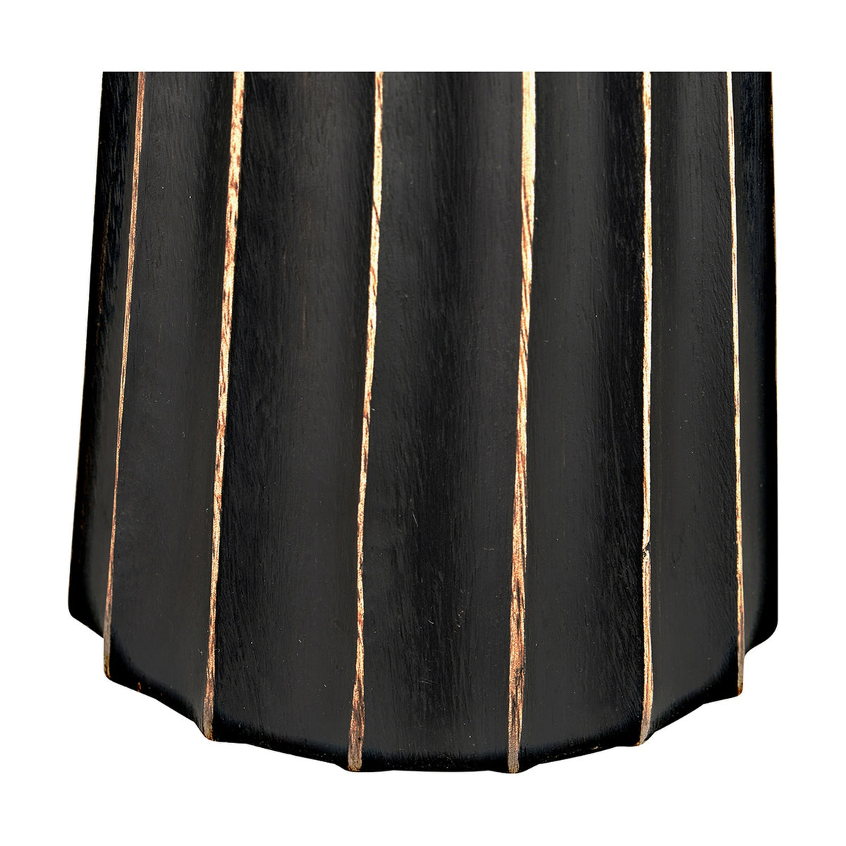 Close-up of the Draydon Black Wash Mango Textured Cone Table Lamp base, showing vertical ridged grooves in a black finish with pale wood tones along the edges.