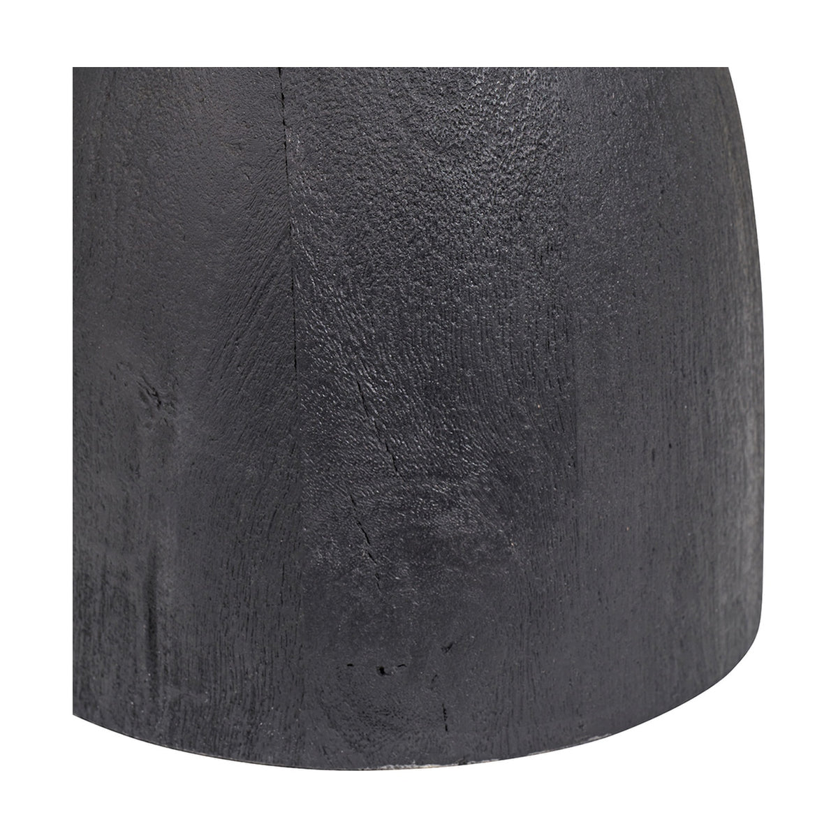 Close-up of the Corella Black Mango Curved Table Lamp Base showing its textured black wood surface and curved silhouette against a plain white background.