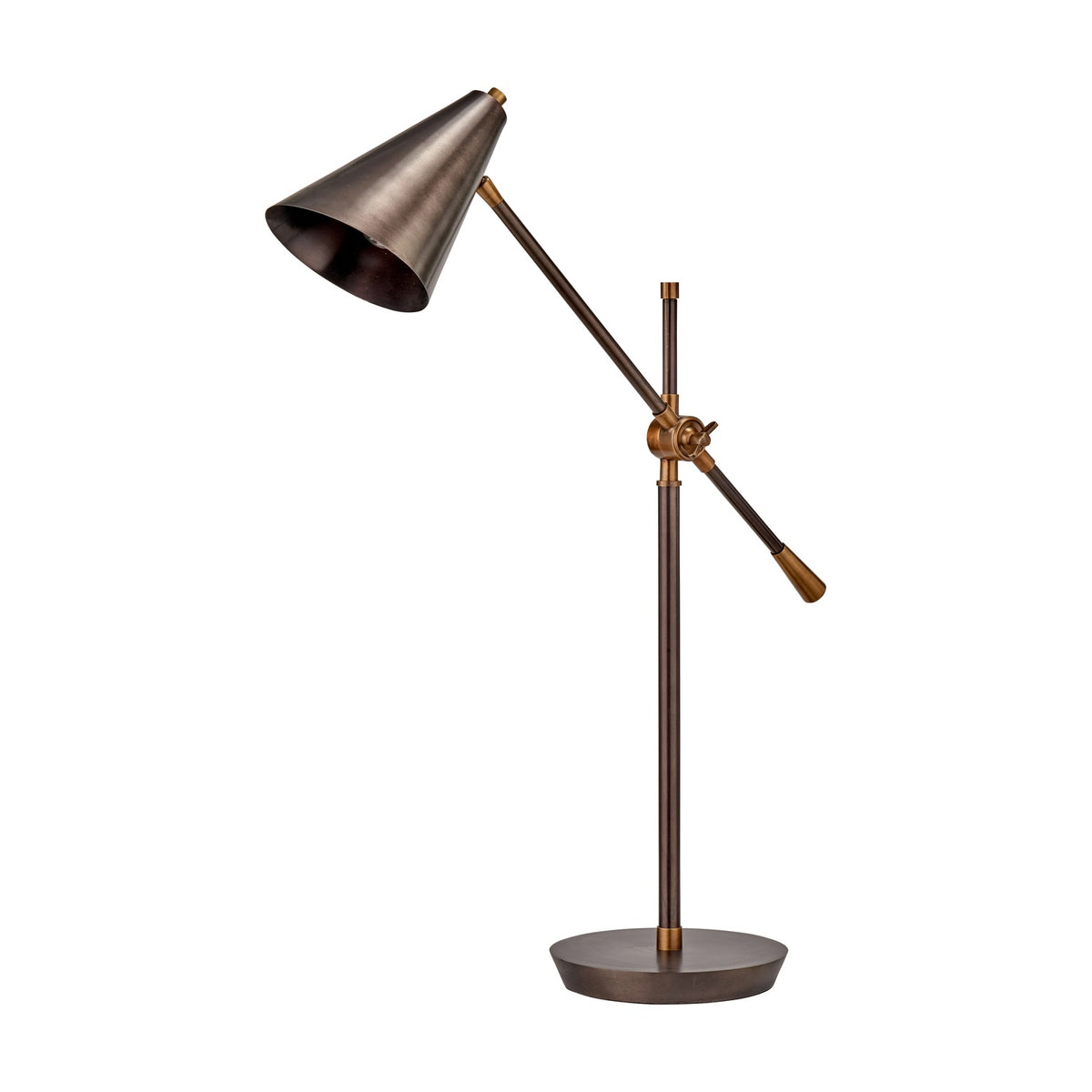 Emiliano adjustable task table lamp in antique bronze with brass fittings, conical metal shade on a hinged arm and round base, set against a plain white background.