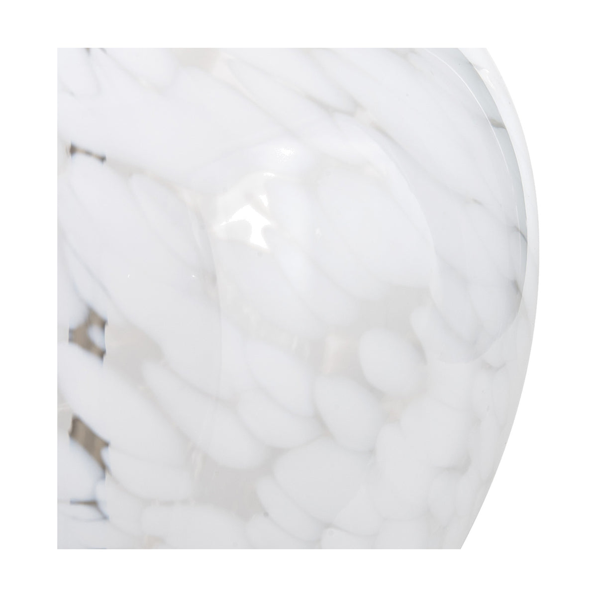 Close-up of the Aurora Speckled White Glass Table Lamp base, showing a mottled white and grey glass surface with a glossy finish.