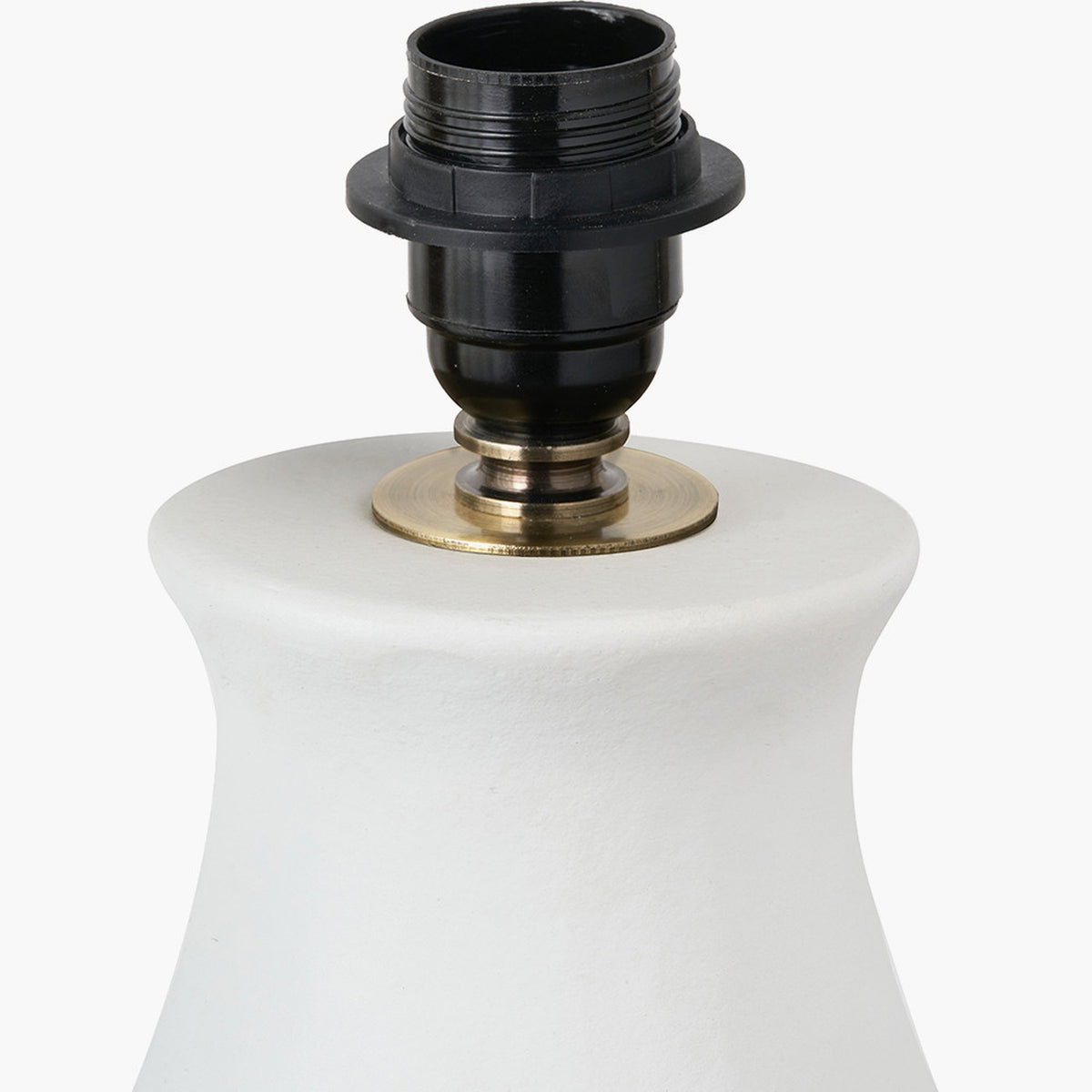 Eirene white textured stoneware table lamp base, close-up of the black E27 lamp holder with brass collar atop the tapered ceramic body, on a plain background.