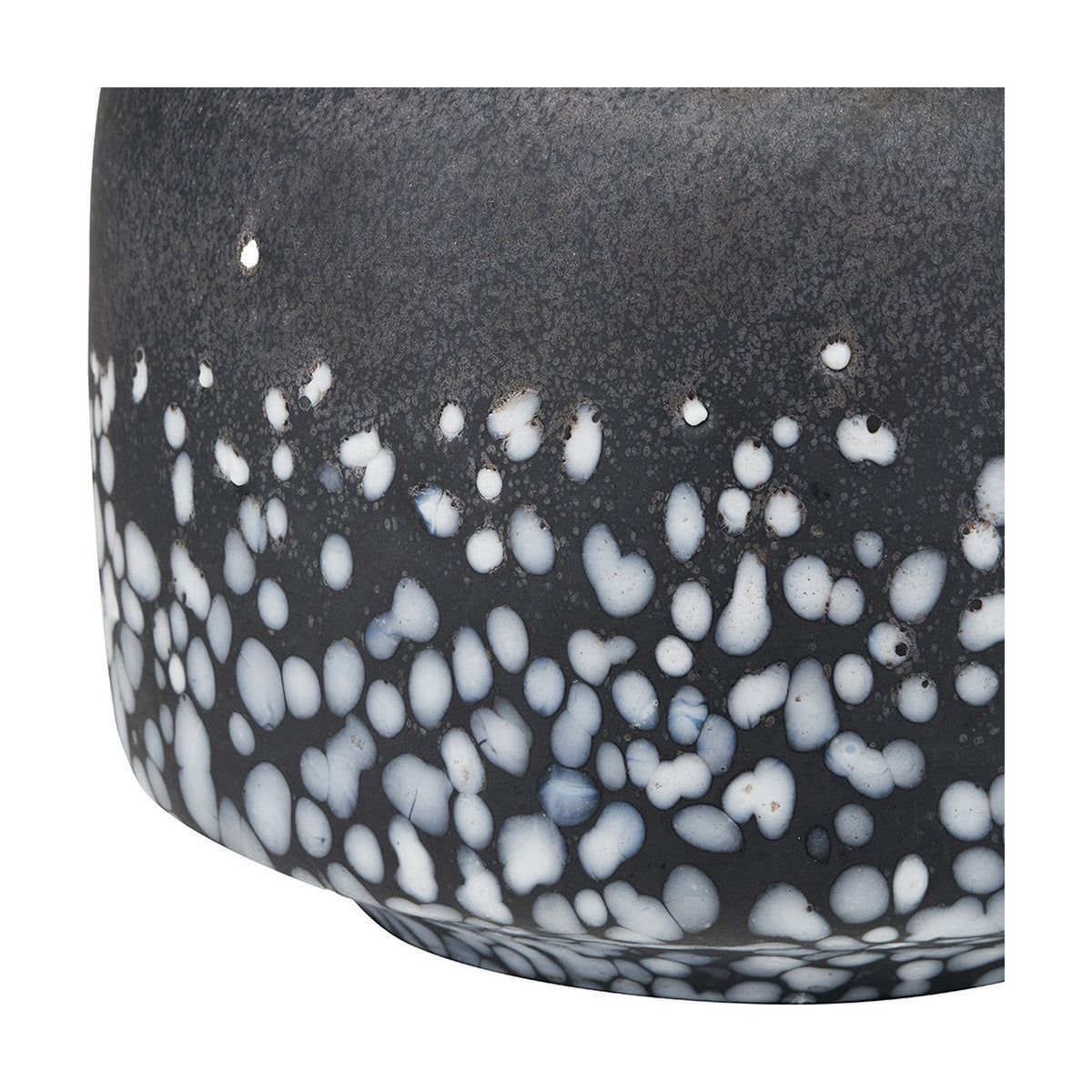 Close-up of the Etna Black & White Glass Table Lamp Base, 33cm, showing a mottled black and white speckled glass texture on a matte dark base.