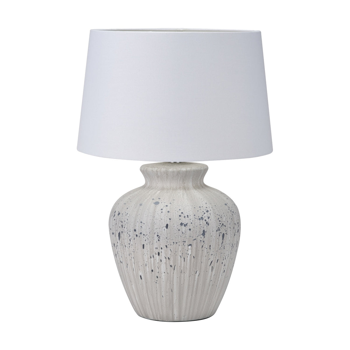 Kalli table lamp with a ridged white and grey speckled ceramic base and a white fabric drum shade, shown on a plain white background.
