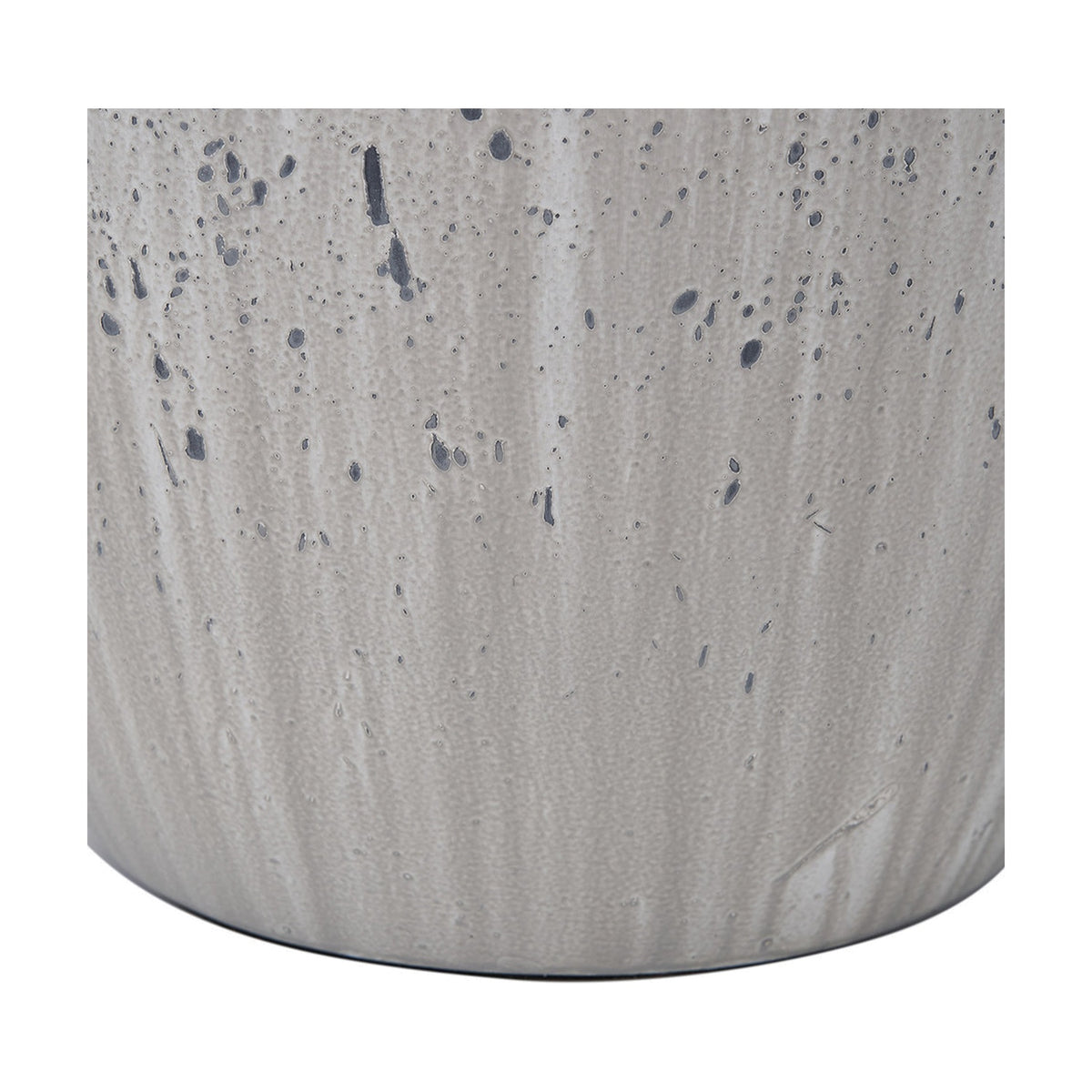 Close-up of the Kalli White & Grey Flecked Ceramic Table Lamp base, showing a textured white ceramic surface with grey speckled detailing.