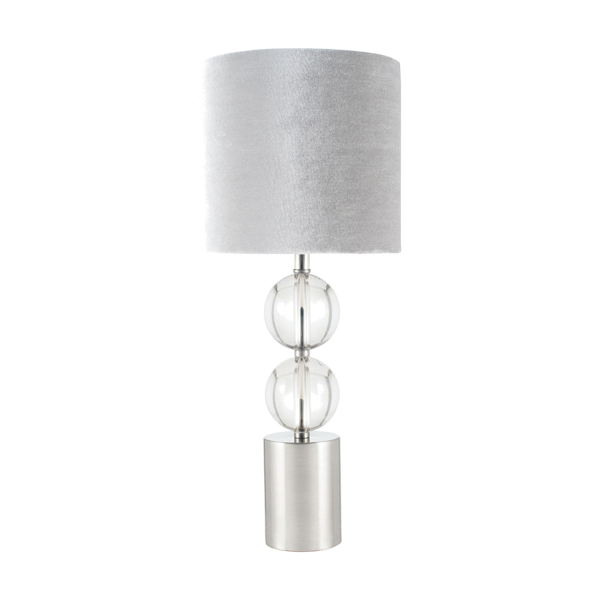 Harris Brushed Silver & Clear Glass Table Lamp with a cylindrical base, stacked clear glass spheres, and a light grey drum shade, shown on a plain white background.