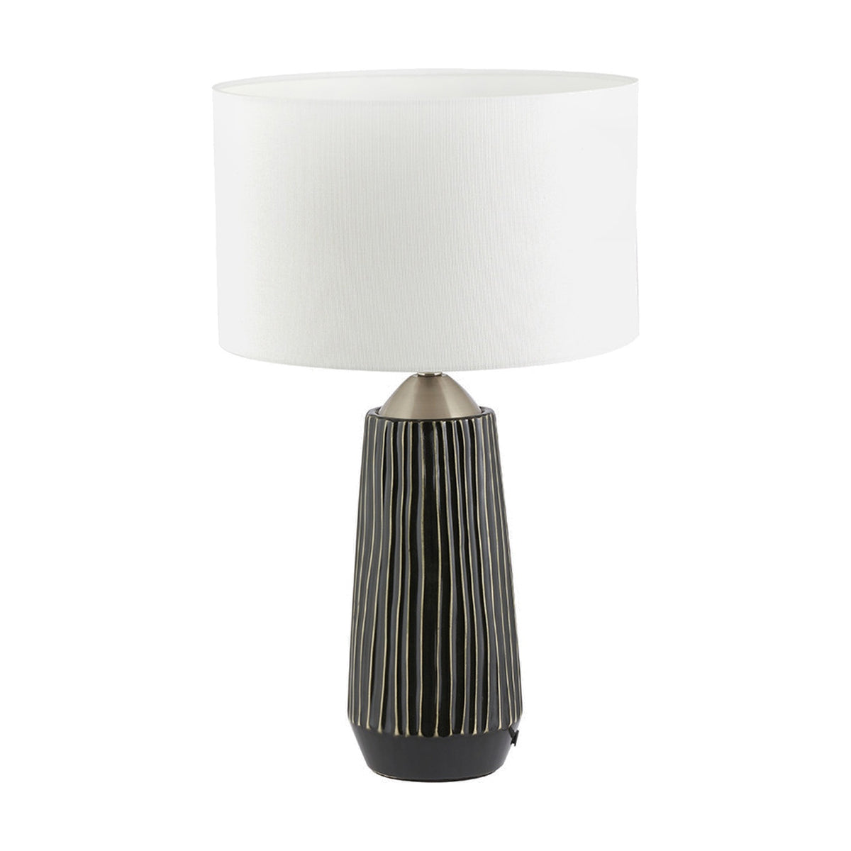 Artemis table lamp with a tall ridged black ceramic base, brushed silver neck, and white drum shade, shown on a plain white background.