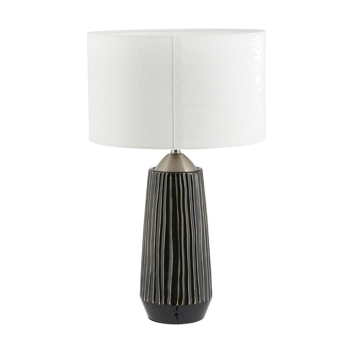 Artemis table lamp with a tall ridged black ceramic base, brushed silver neck fitting, and white drum fabric shade, shown on a plain white background.