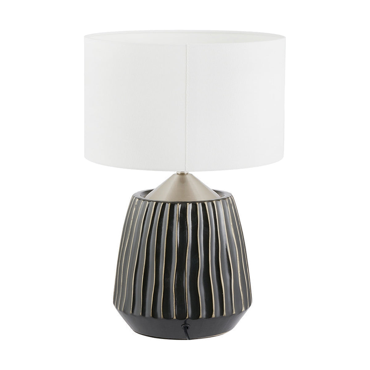 Artemis table lamp with a ridged black ceramic base and brushed silver neck, topped with a white drum fabric shade, shown on a plain white background.