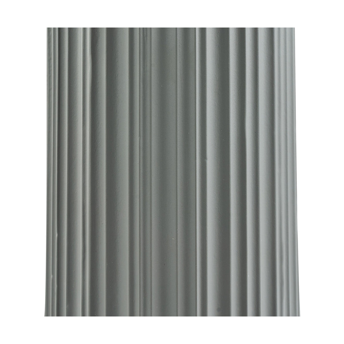 Close-up of the fluted grey ceramic base of the Ionic table lamp, showing ridged vertical texture in a matte finish.