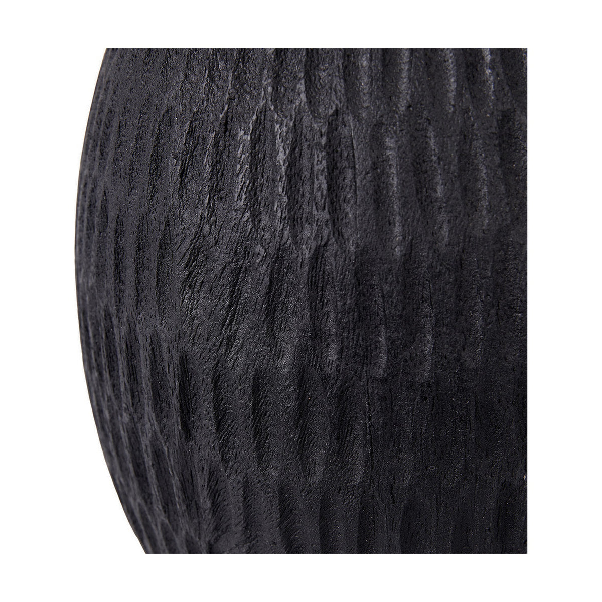 Close-up of the Ioan Black Engraved Wood Bottle Table Lamp Base, showing textured carved wood grain in a matte black finish.