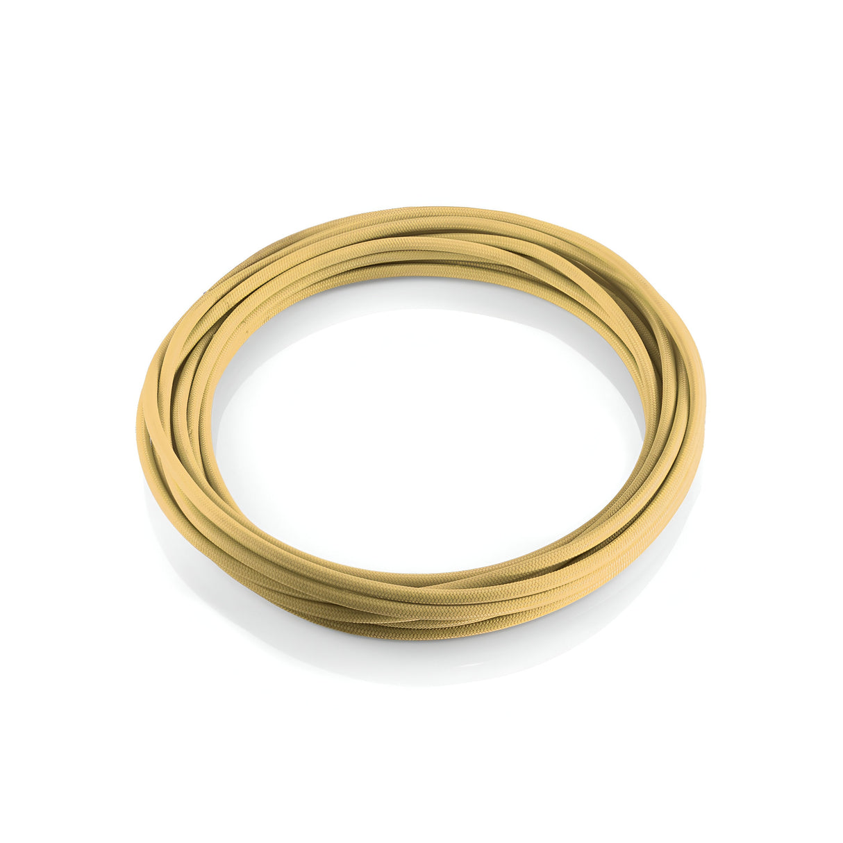 A neatly coiled Next Fabric Lighting Cable 10m - Brass, showcasing its vintage-inspired style, lies on a white surface. The beige cable is circular in shape and crafted from a smooth, flexible material.