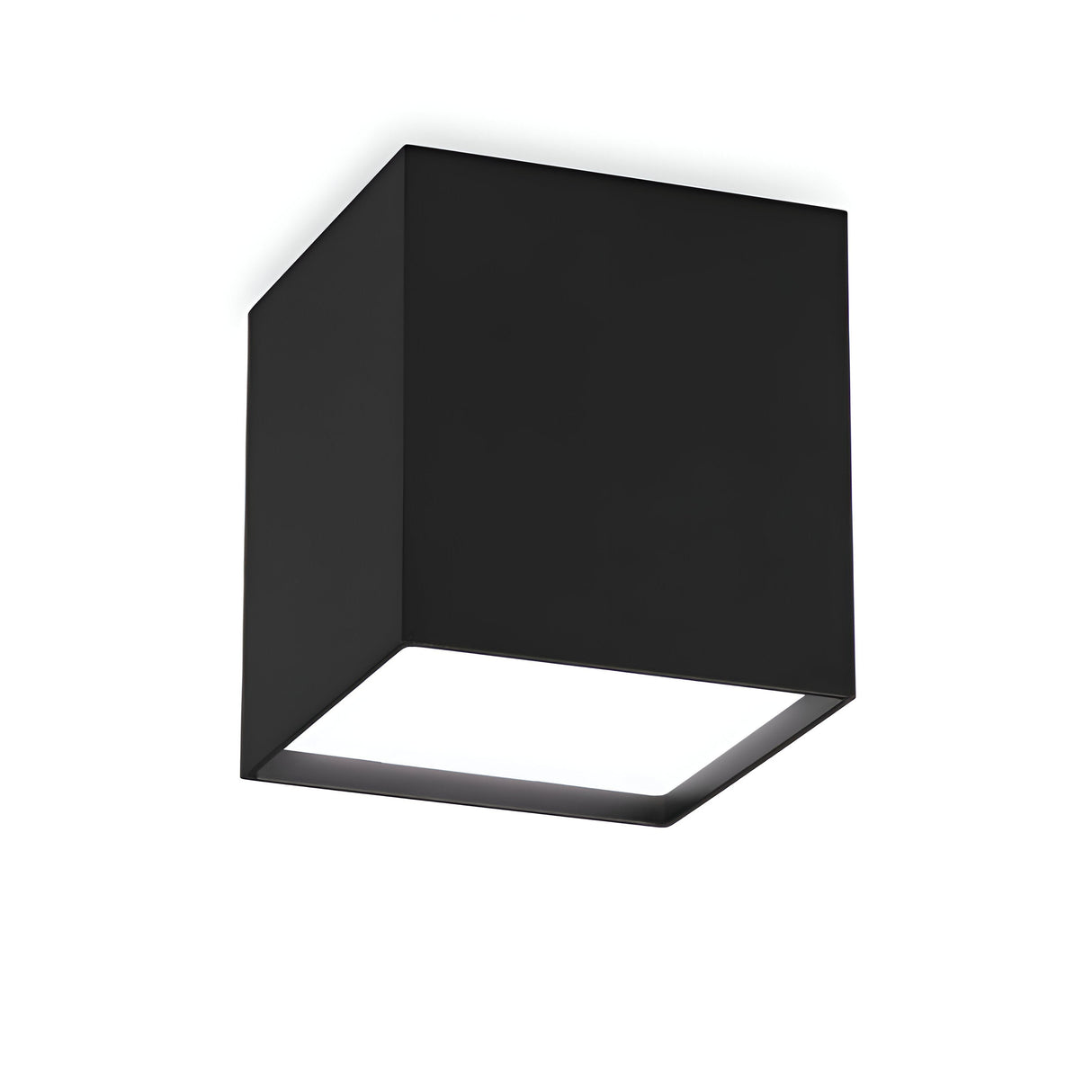 The Luminex LED Downlight 10W 3000K - Black features a minimalist, cube-shaped design with a matte finish, offering modern and sleek illumination through an LED downlight emitted from the bottom face while ensuring energy-efficient performance.