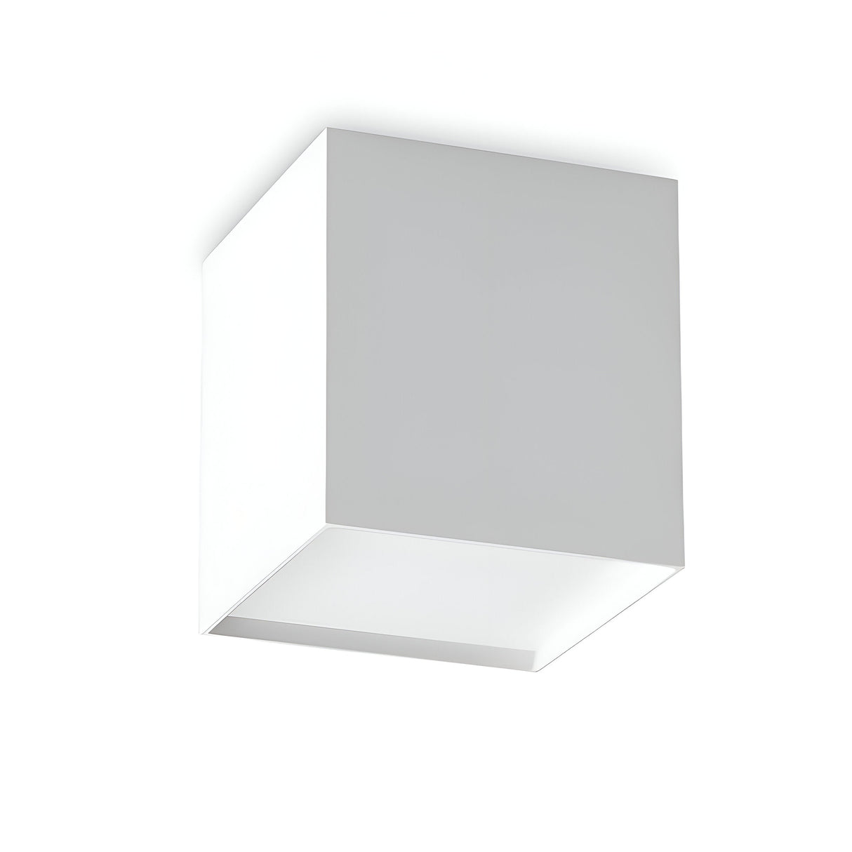 The Luminex LED Downlight 10W 3000K - White, with its minimalist and cube-shaped design, stands out against a plain white background, adding a modern touch. Its smooth and flat surface provides energy-efficient lighting while maintaining its sleek shape and color.