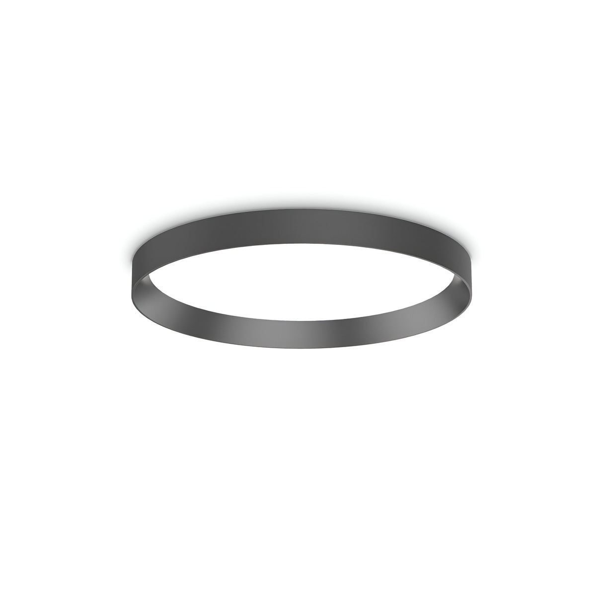 The Spark LED Flush Light 26W 3000K - Black, with its sleek circular design, is mounted on a white ceiling, providing an energy-efficient soft glow.