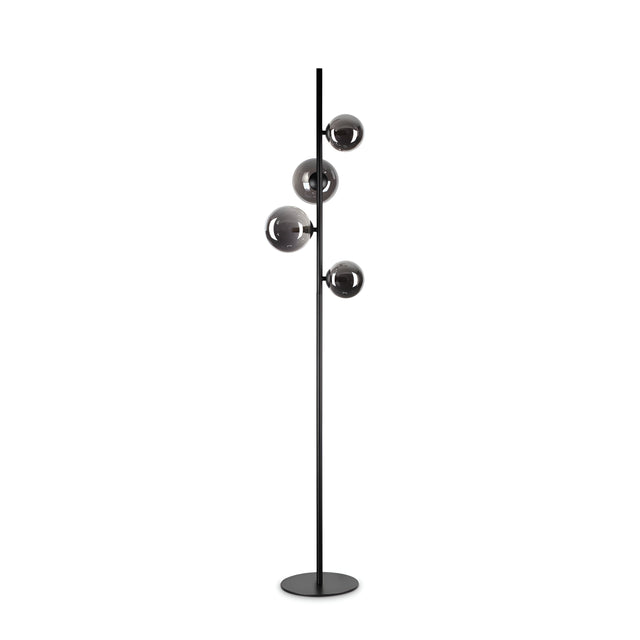 The Solana Floor Lamp - Black boasts a minimalist design with a sleek black metal stand and three glossy, spherical lampshades arranged vertically. It provides ambient lighting with reflective lampshades that enhance any modern decor with a contemporary flair.