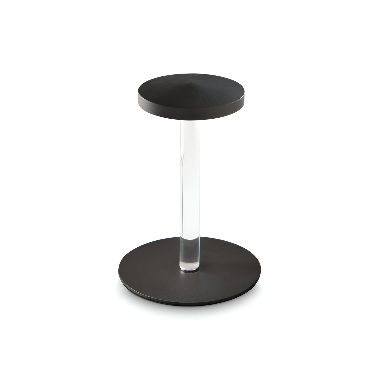A modern, minimalist black side table featuring a circular base and top, connected by a transparent cylindrical support. Complement its sleek design with the Solixis LED Table Lamp 3.6W 3000K in black for an elegant and cohesive look.