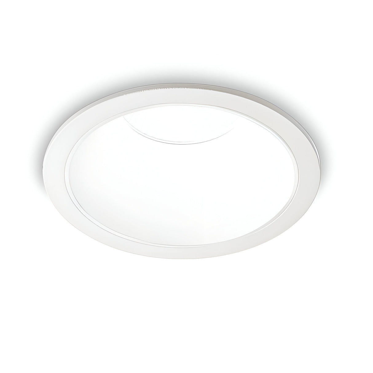 The Sally LED Round Recessed Trim Downlight in white boasts a modern and minimalist design with its wide circular rim and flat surface. This fixture provides ambient lighting at 3000K, and its IP65 rating ensures durability against dust and water.