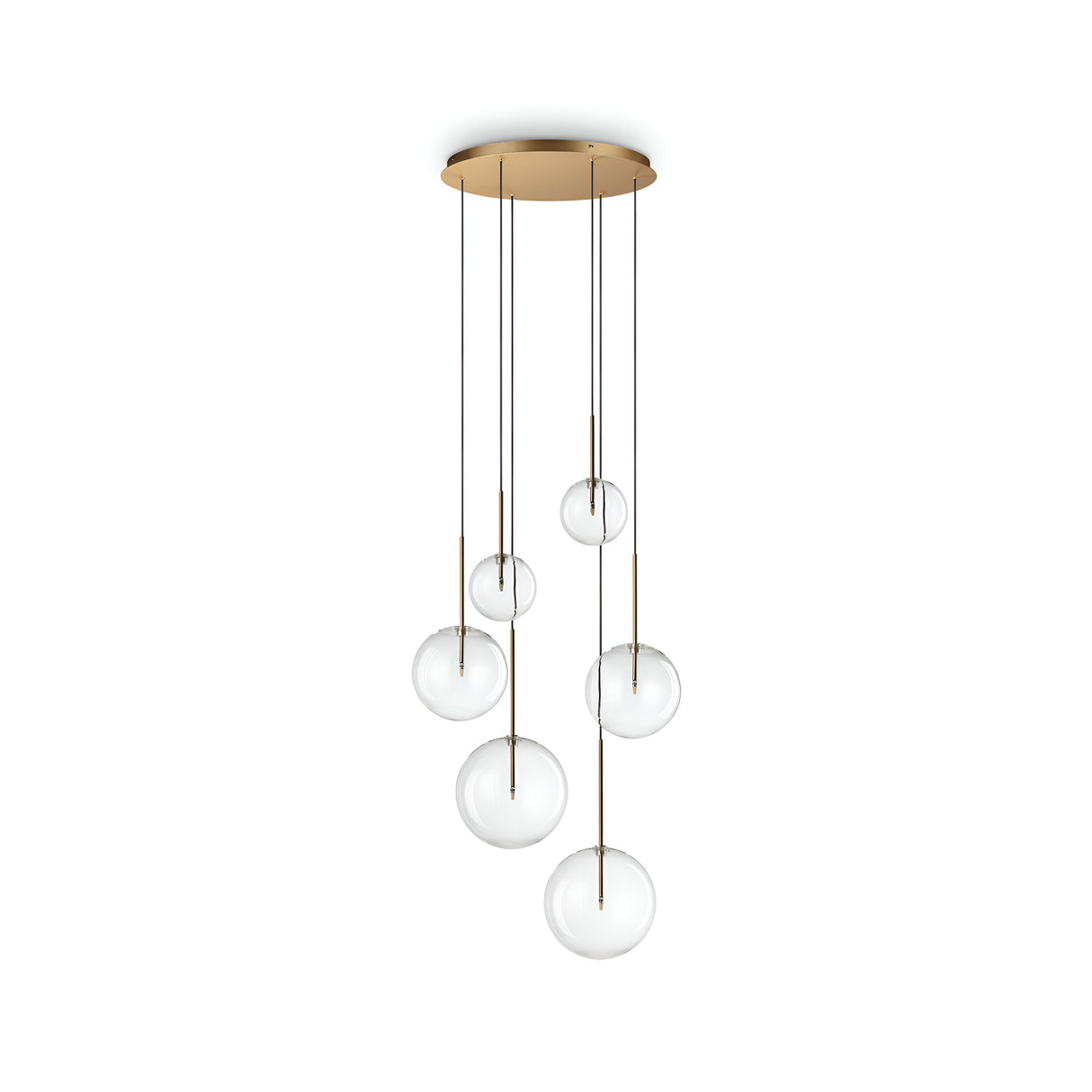 The Solarae 6 Light Cluster Pendant - Brass is a contemporary lighting fixture that showcases a gold circular base and six glass orbs hanging at different heights, suspended by slender rods. The clear orbs offer a minimalist and elegant design.