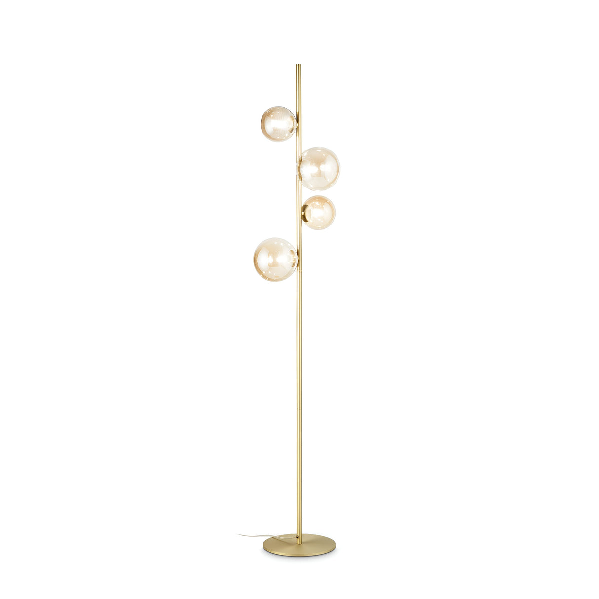The Solana Floor Lamp - Brass features a satin brass stand and a circular base, with four spherical glass bulbs elegantly arranged in a vertical alignment along the pole. It delivers an ambient glow that enhances its stylish and sophisticated look.