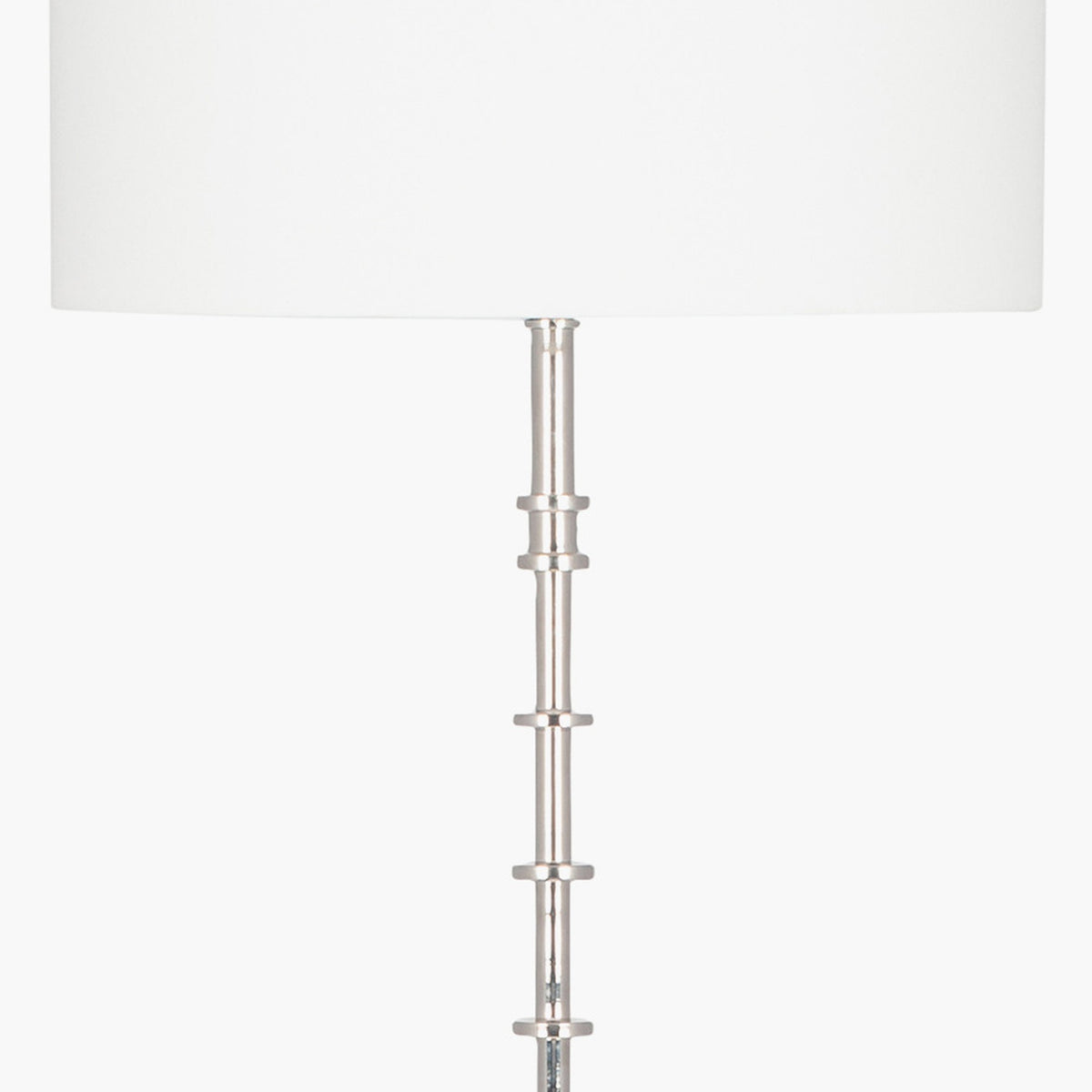 Almas Silver Aluminium Floor Lamp Base close-up showing ridged metal stem detail beneath a white drum shade, on a plain background.