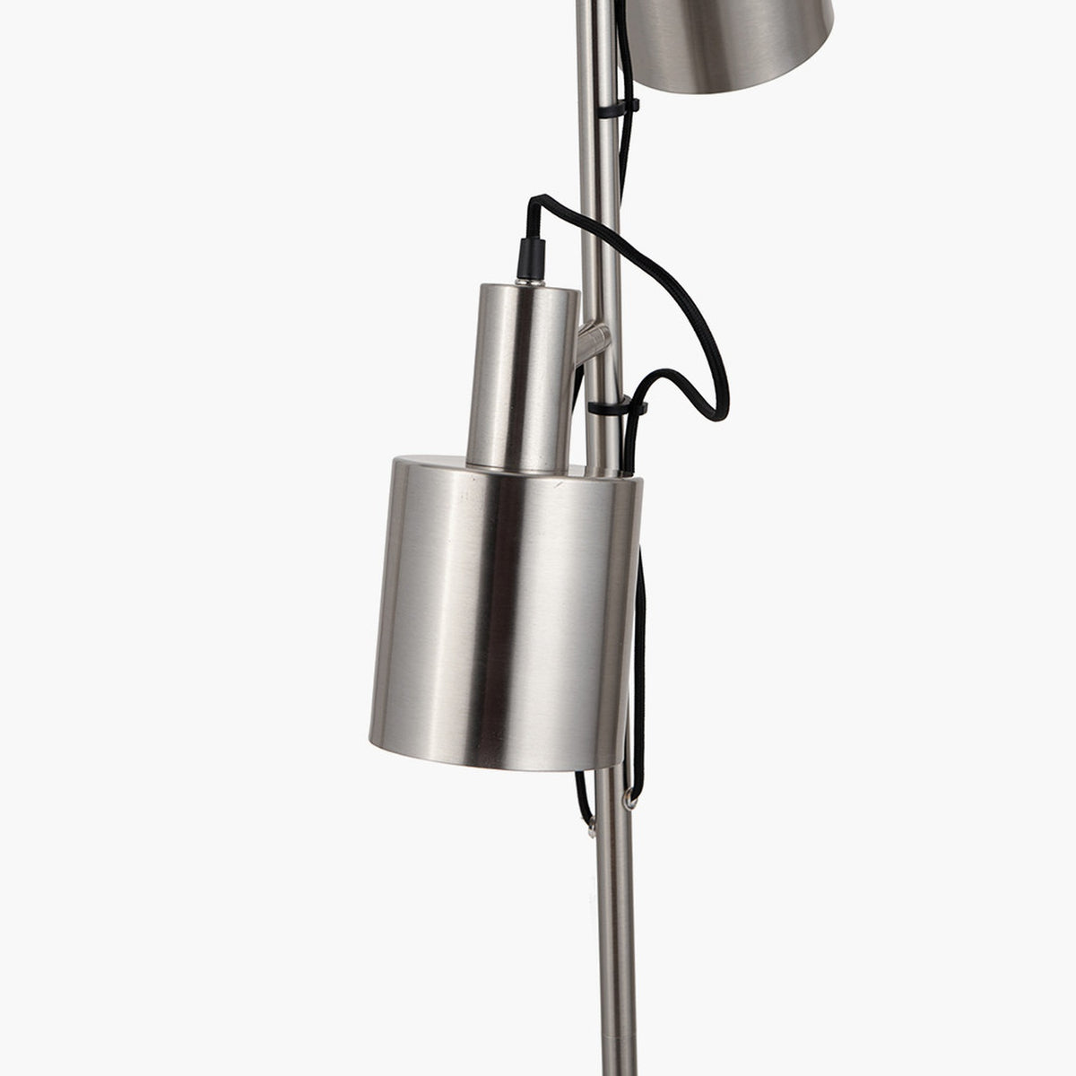 Close-up of the Aaron Brushed Chrome Silver Task Floor Lamp's cylindrical shade and adjoining pole with black cable, showing the brushed metal finish against a plain white background.