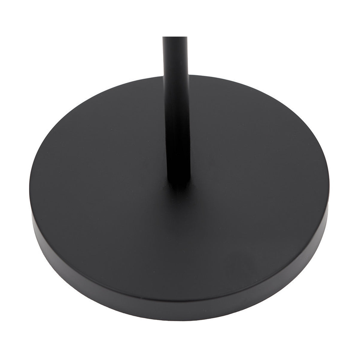 Close-up of the round matte black iron base of the Aaron Black Iron Task Floor Lamp, showing the metal upright stem, against a plain white background.