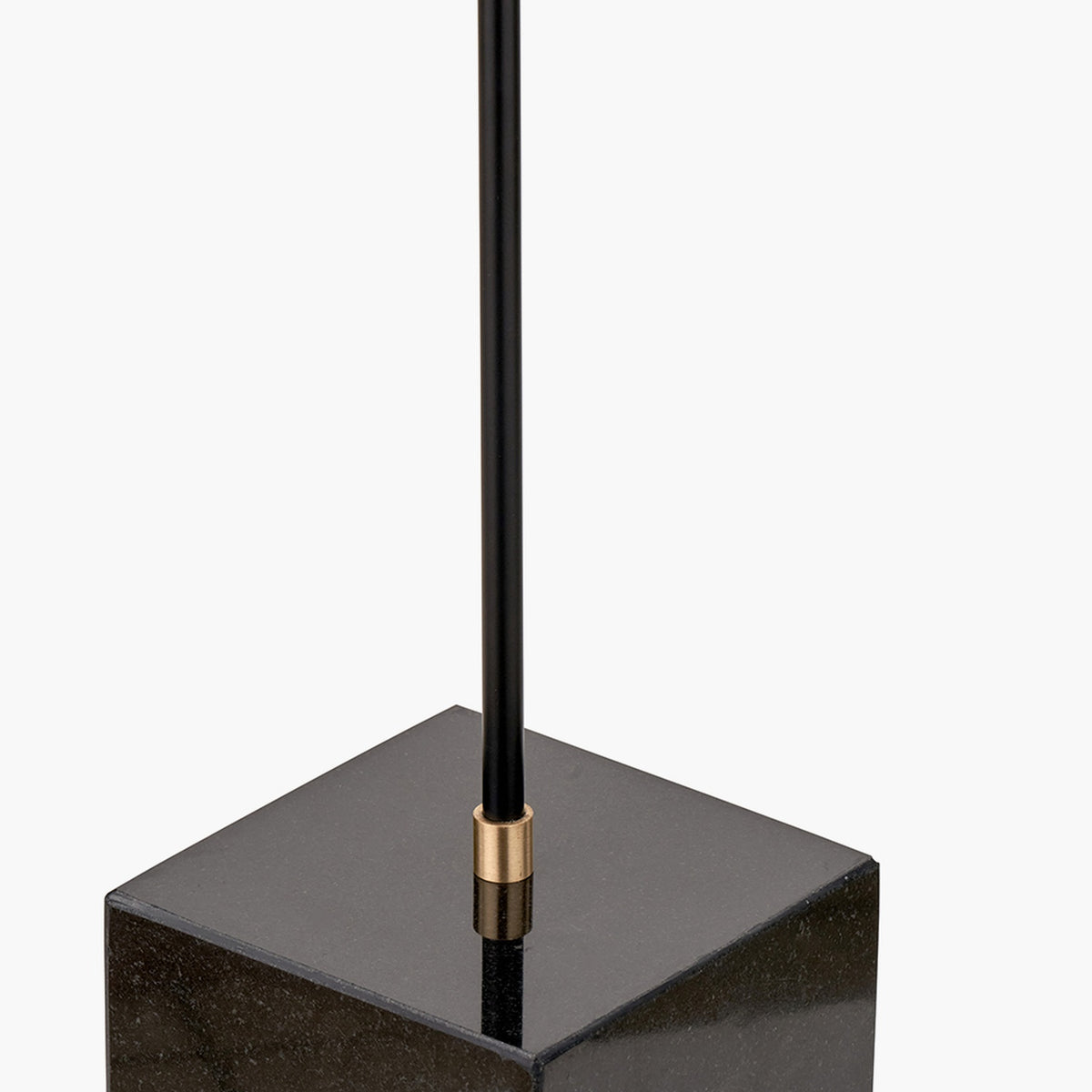 Close-up of the Mayfair Matt Black Domed Task Floor Lamp showing the slim black metal rod meeting a square black marble base with a brass collar detail.