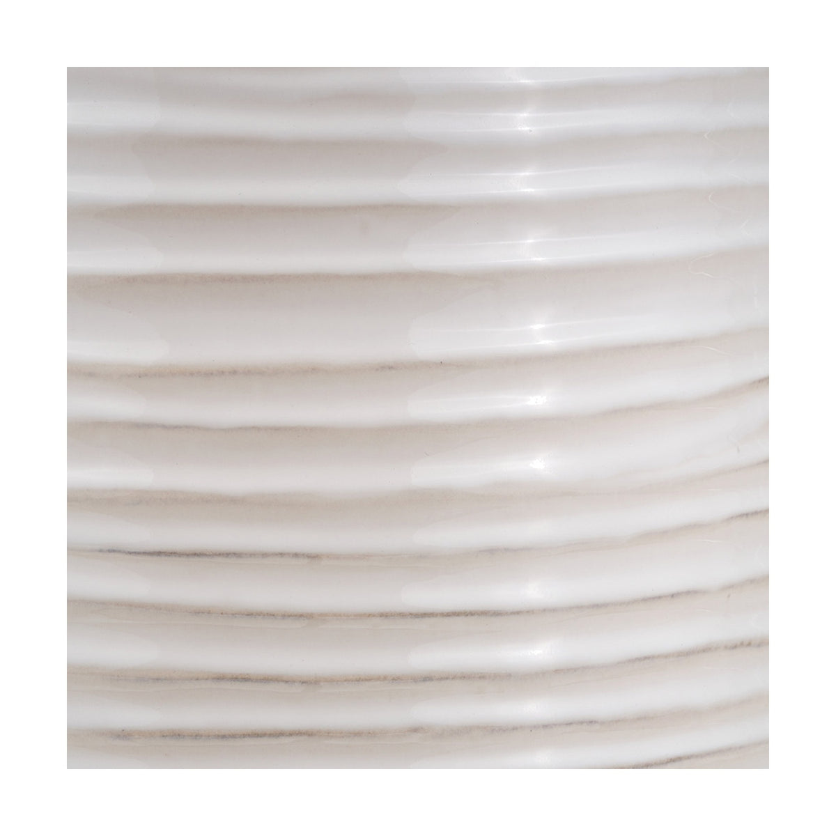 Close-up of the Linnea White Grooved Ceramic Floor Lamp base, showing glossy white ceramic with horizontal ribbed grooves and subtle grey shading.