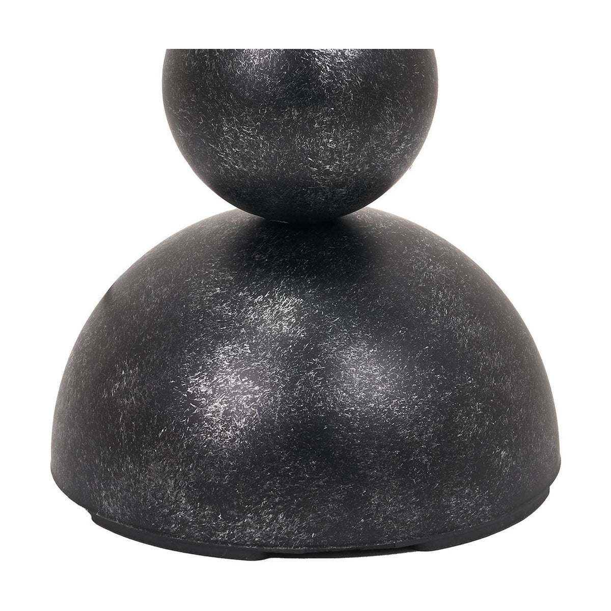 Close-up of the Vala Graphite floor lamp's stacked ball and dome base in textured metal with a matte grey finish, shown against a plain white background.
