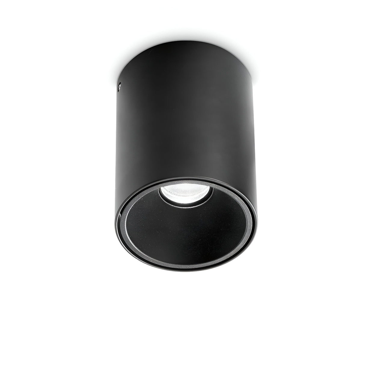 The Lucent LED Round Downlight 25W 3000K in black features a smooth cylindrical design, seamlessly mounted on a white background. This energy-efficient lighting solution encapsulates a modern and contemporary aesthetic, making it an ideal choice for stylish interiors.
