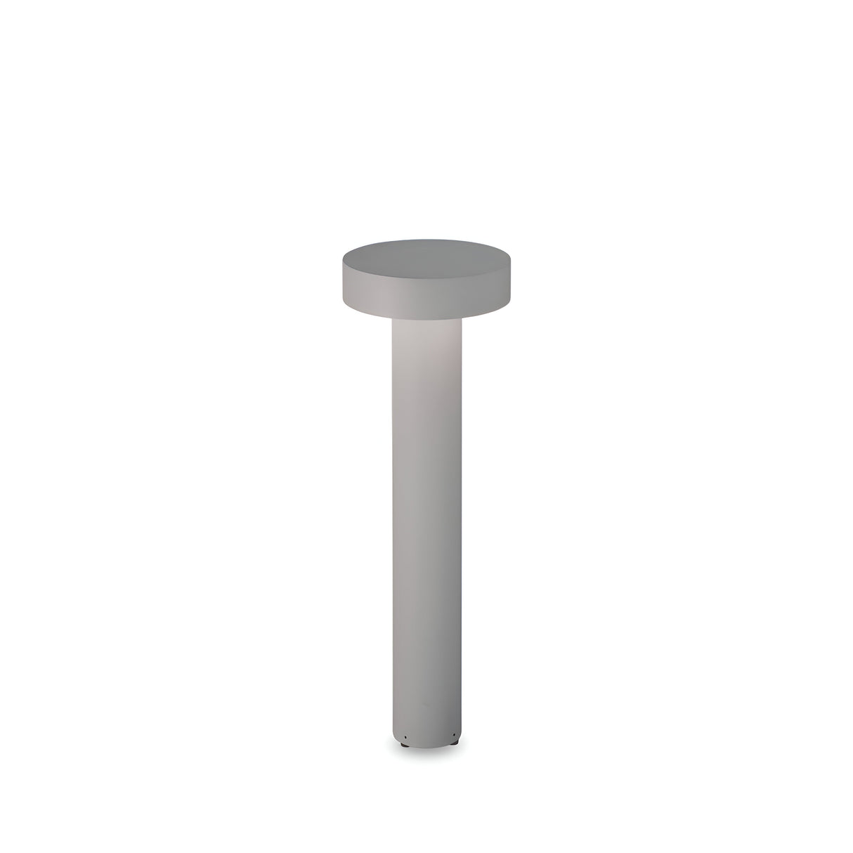 The Gloara Outdoor Bollard Light - Grey, 60cm, is a stylish and contemporary enhancement for outdoor lighting. Its design showcases a cylindrical base paired with a round top, radiating modern elegance with a smooth finish in a neutral grey hue. Gentle illumination softly emanates from beneath the top disc.