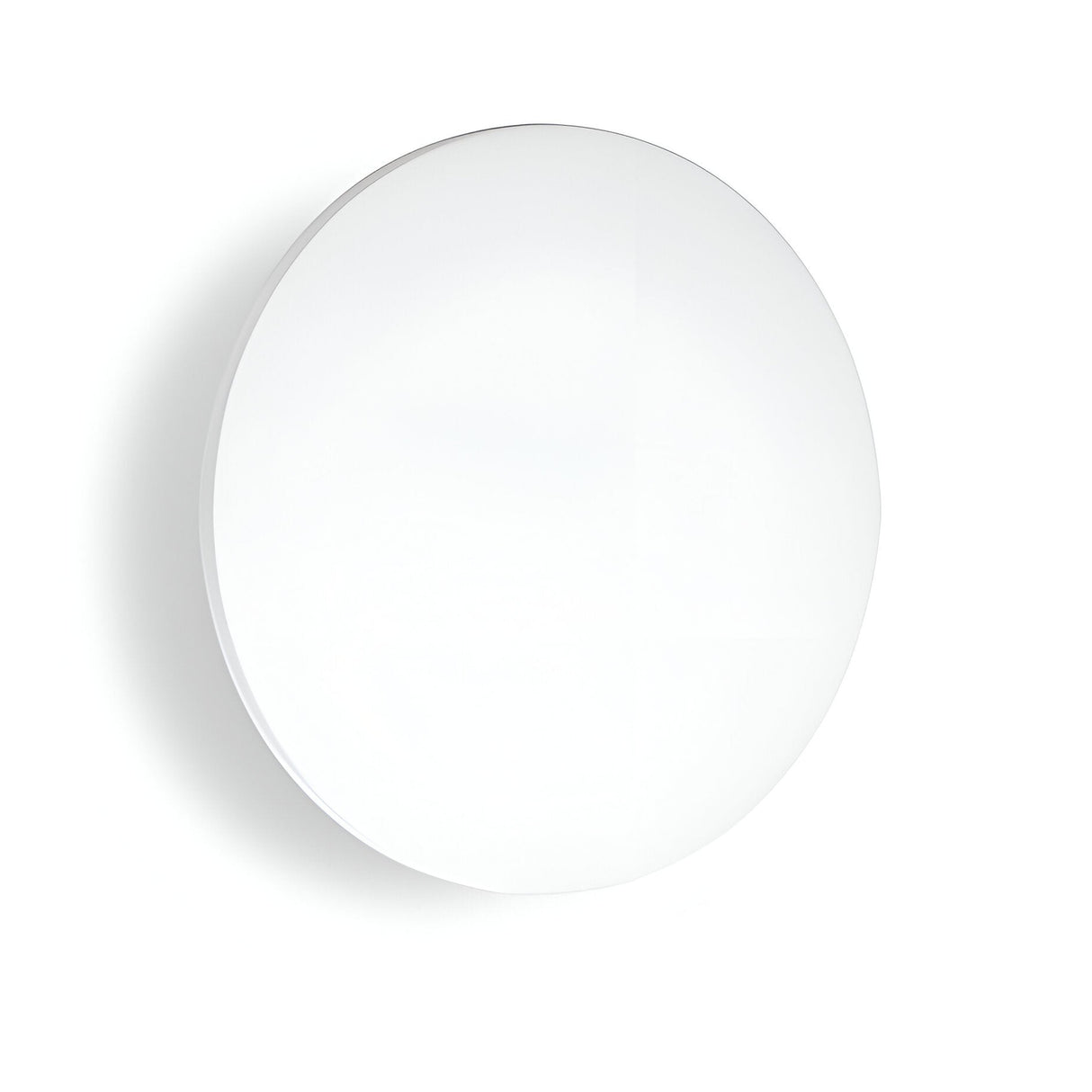A simple, round white wall clock without numbers or markings sits against a plain white background, embodying the minimalist elegance reminiscent of the Eclipseax Outdoor LED Wall Light 12W 3000K. Its design focuses on smooth surfaces and clean lines, similar to the sleek aesthetics found in this modern exterior lighting solution.