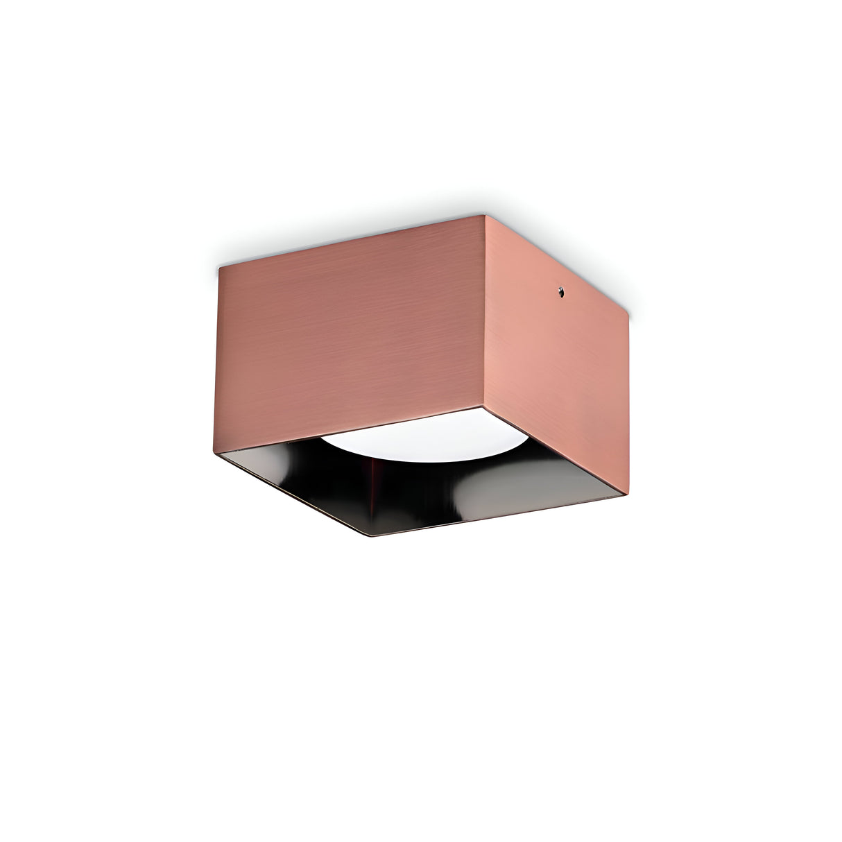 Introducing the Orbis Square Downlight - Copper, a sleek ceiling-mounted fixture with a minimalist square design. It features clean lines and a smooth surface, with a central white bulb for optimal lighting. This modern downlight prioritizes sustainability by accommodating a replaceable LED, ensuring eco-conscious efficiency.