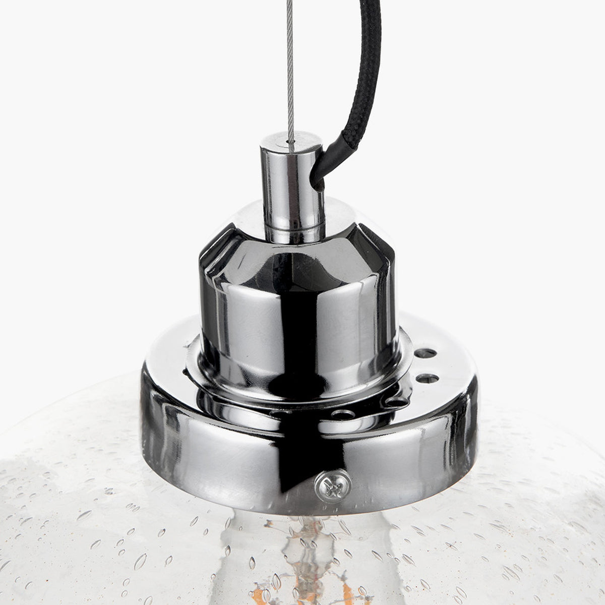 Close-up of the Beja Organic Shape clear bubble glass pendant light's chrome fitter, showing the cable suspension, faceted mount, and screw-fixed ceiling plate against a white background.