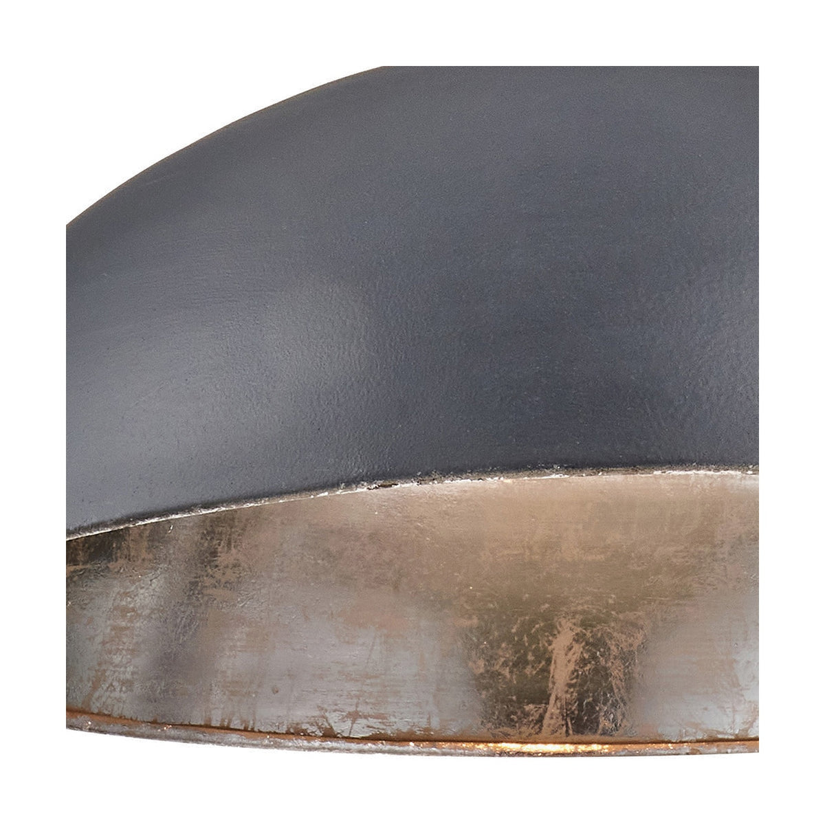 Close-up of the Anders Iron Dome Pendant Light, 62cm, showing matt black exterior and silver leaf interior finish with visible seam detail.