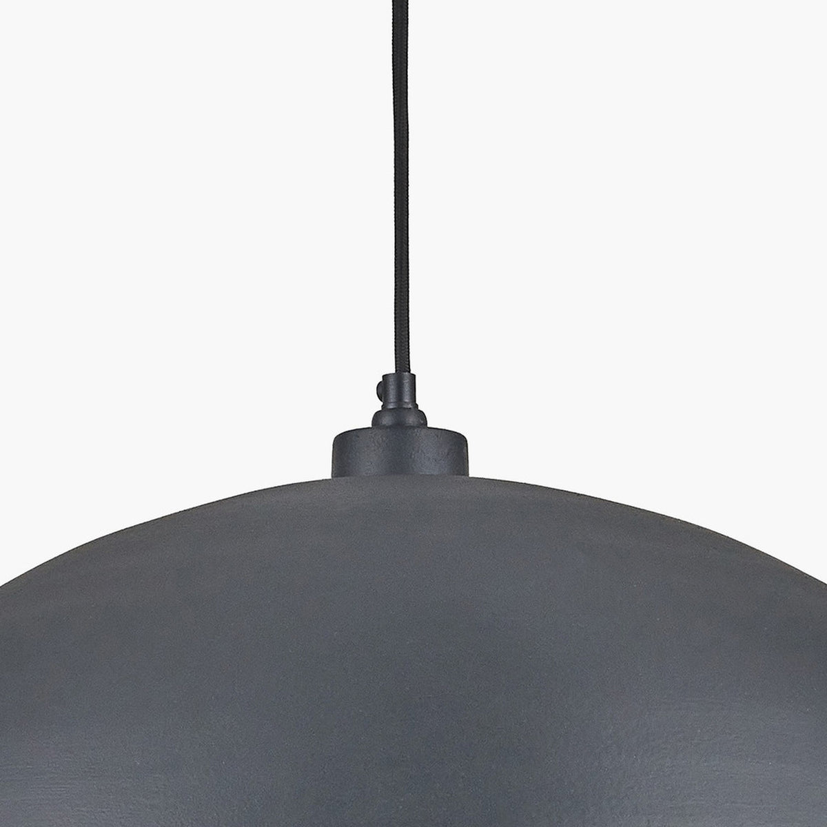 Close-up of the Anders 62cm dome pendant light in matt black iron with a fabric-braided flex and cylindrical ceiling fitting, against a plain white background.