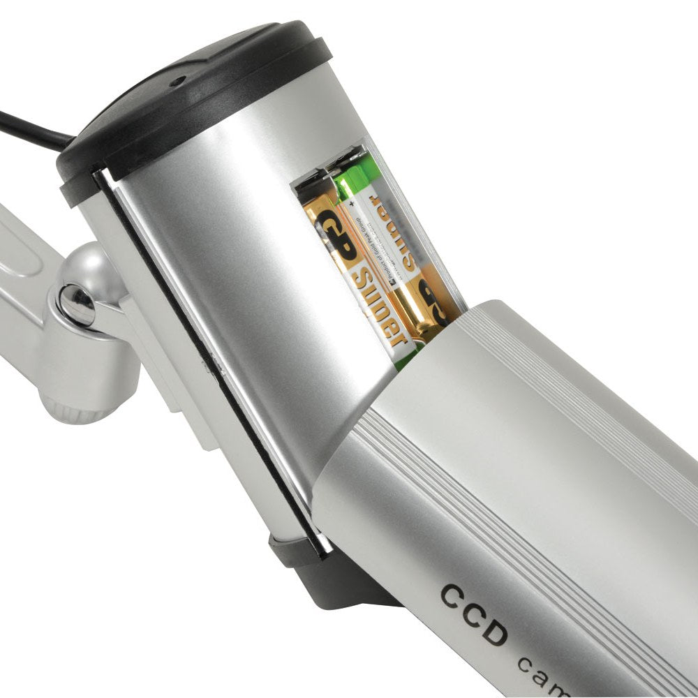 Close-up of the AVSL Mercury Dummy IR Bullet CCTV Camera showing the open silver plastic housing with two AA batteries fitted inside the compartment.