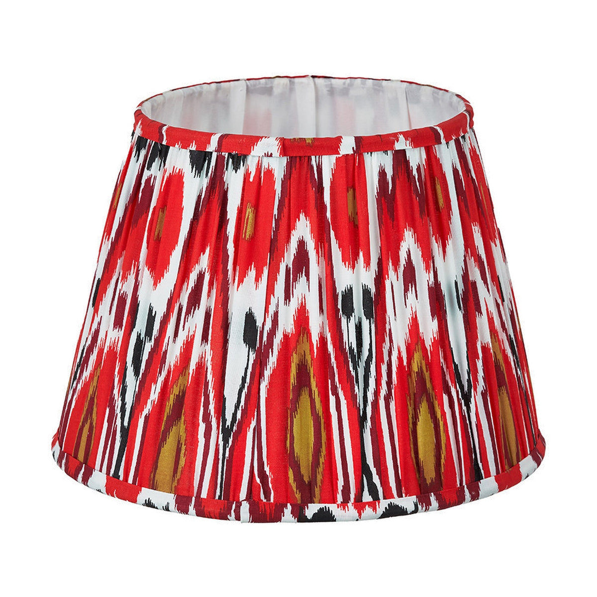 Izara Red Ikat Pleated Tapered Lampshade, 30cm, in a red, white, and black ikat pattern fabric with pleated sides, shown on a plain white background.