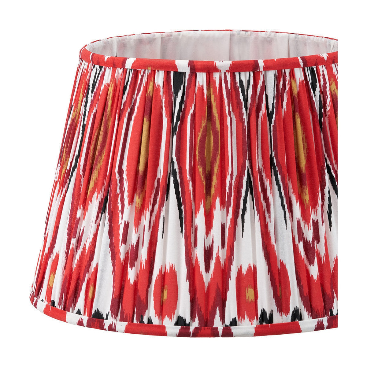 Izara Red Ikat Pleated Tapered Lampshade, 35cm, in a red, white and black diamond ikat pattern with pleated fabric and white lining, shown on a plain background.