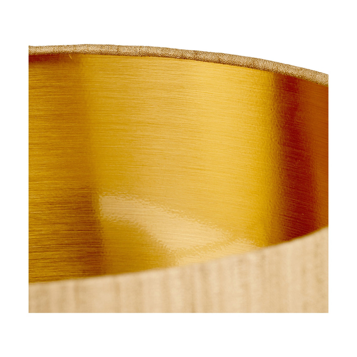 Close-up of the Stellan Gold Slubbed Silk Mix Lined Cylinder Lampshade, 30cm, showing the brushed gold interior lining and natural slubbed fabric outer edge.