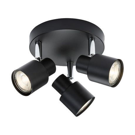 The Triple Spotlight - Matt Black is a round ceiling fixture with three adjustable GU10 spotlights. Its black finish and downward-directed lights offer a modern, sleek design suitable for various interior settings.