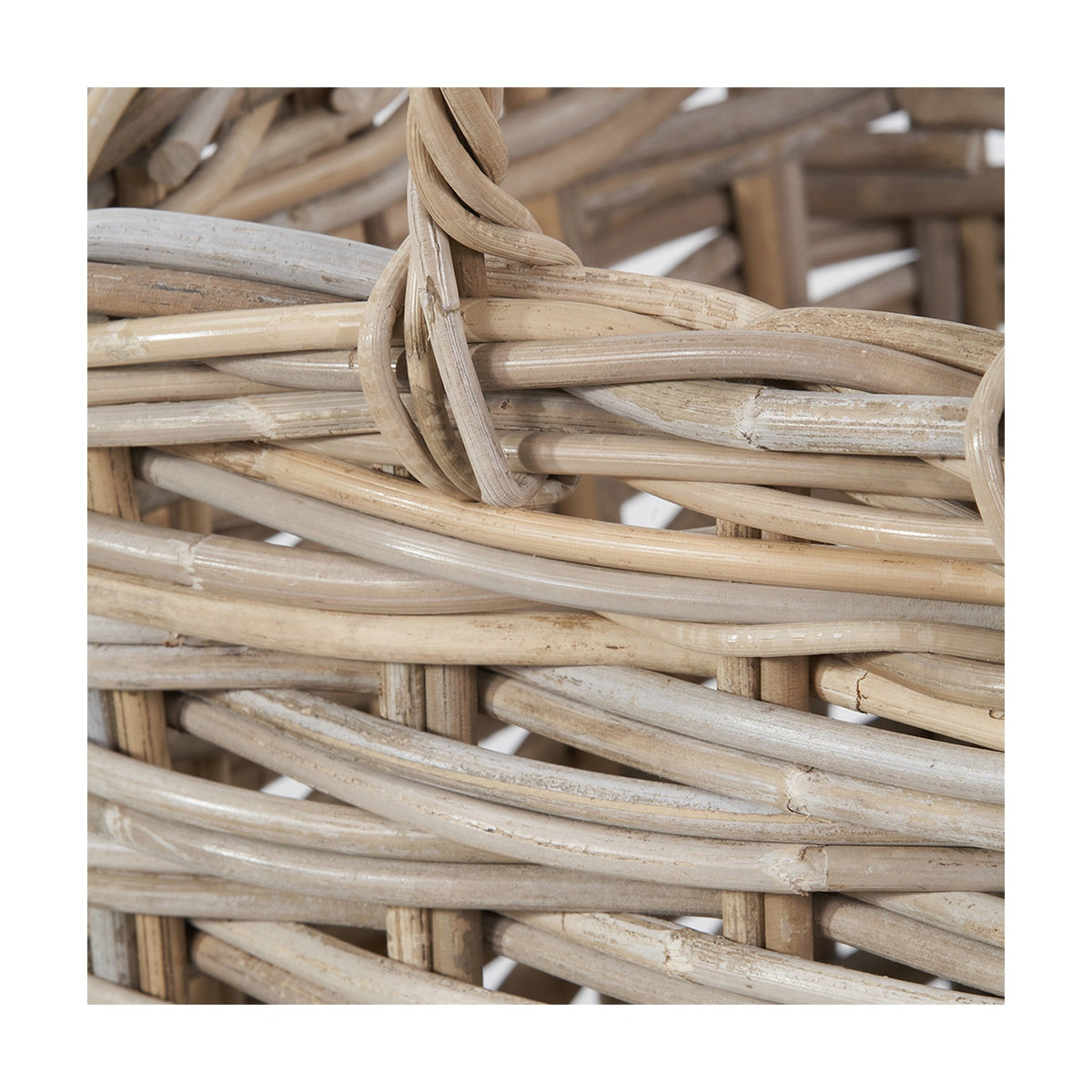 Close-up of the Tobs Kubu Umbrella Basket showing woven grey rattan strands with visible looped handle detail and natural texture.