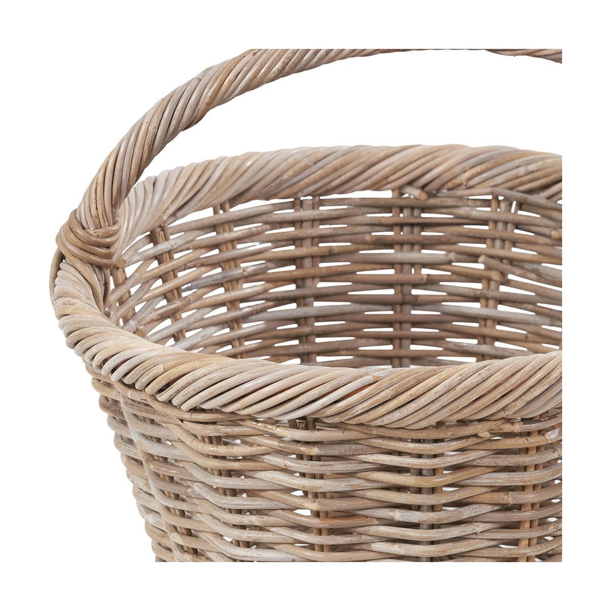 Close-up of a grey Kubu rattan oval shopping basket, showing the tightly woven body, curved twisted-cane handle, and looped handle joins.