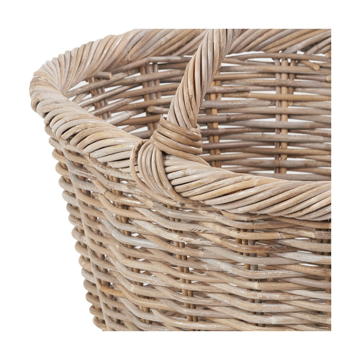 Close-up of a grey Kubu rattan oval shopping basket, showing the twisted woven handle join and tightly woven sides in a natural fibre finish.