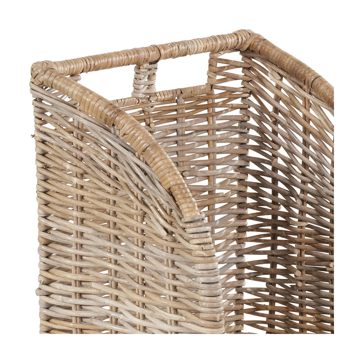 Close-up of a grey Kubu rattan log basket from the Tobs set, showing woven cane texture and curved corner detailing against a plain white background.