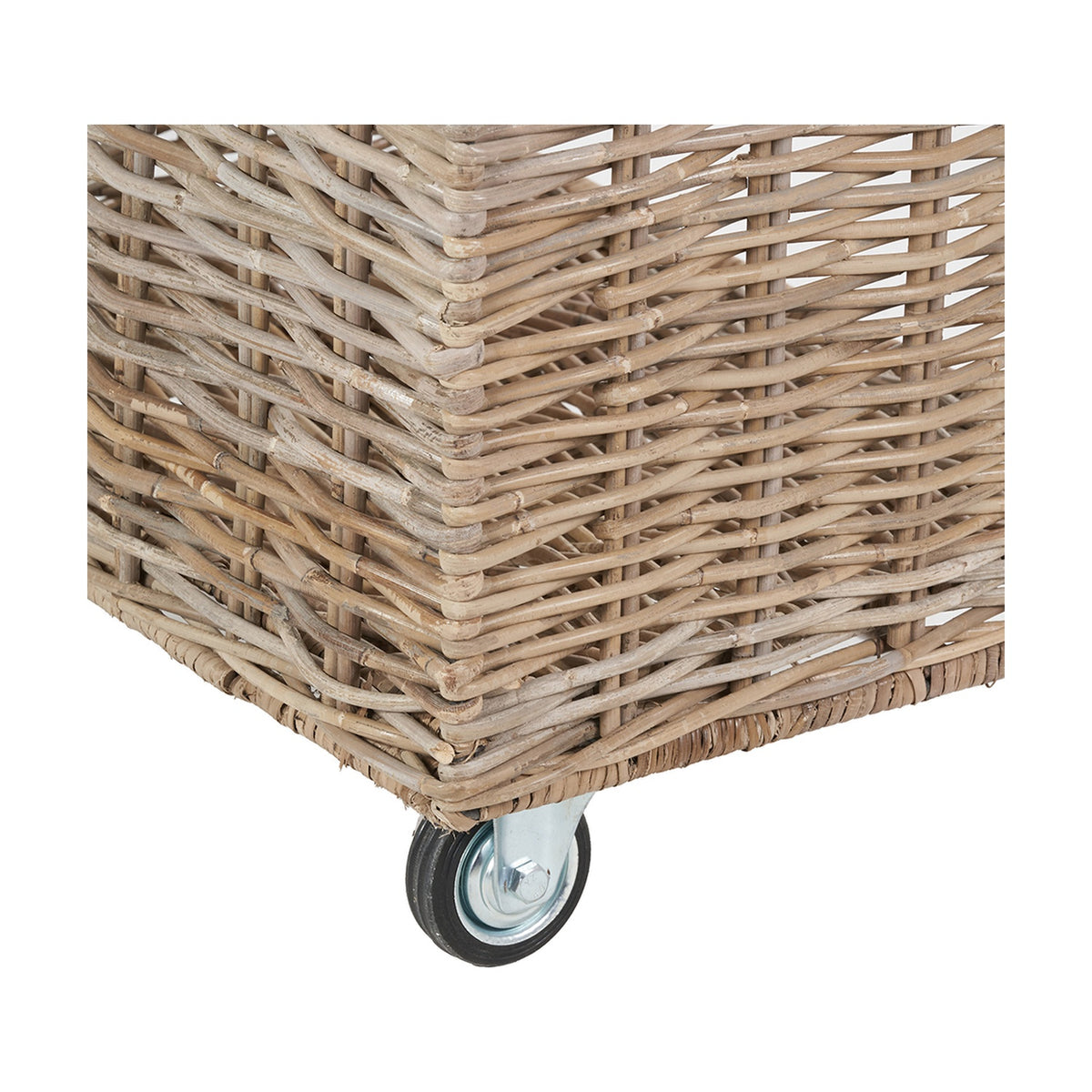 Close-up of the Tobs grey Kubu rattan log basket trolley corner, showing woven rattan texture and a metal castor wheel, on a plain white background.
