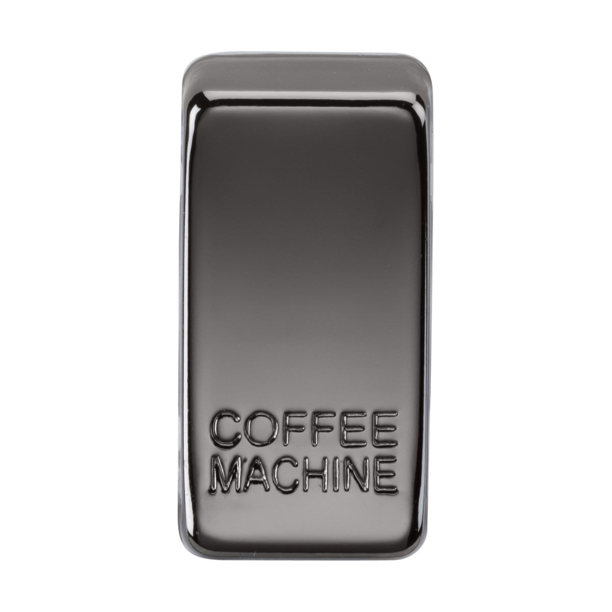 Introducing the sleek Switch Cover "Marked COFFEE MACHINE"—a fridge magnet designed with inspiration from a classic coffee capsule. Its shiny black nickel finish elegantly reflects light, adding a sophisticated touch to your kitchen decor.