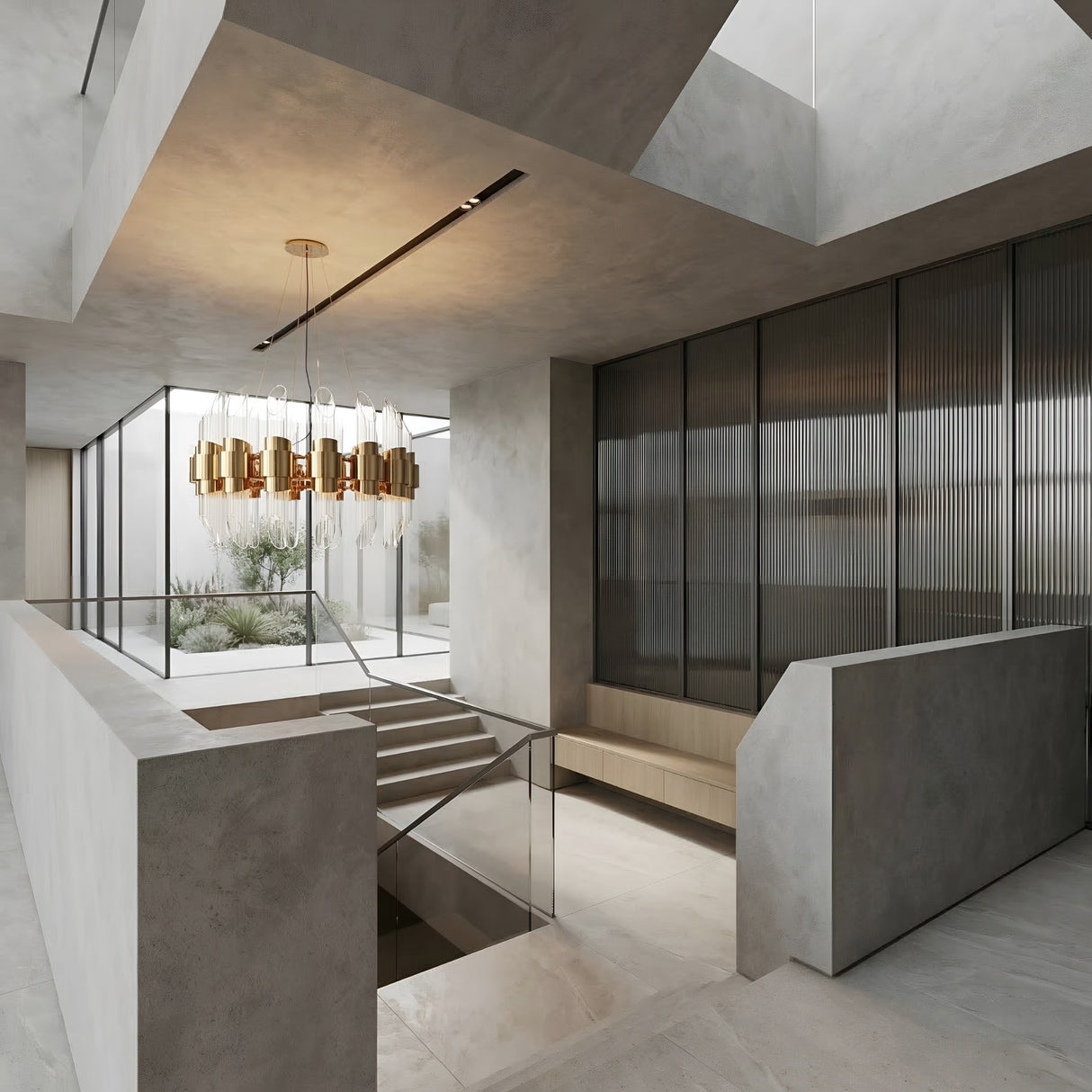 A modern interior with concrete walls, a glass-railed staircase, the Tycho 6 Light Crystal Chandelier in gold & white, built-in bench seating, and floor-to-ceiling windows overlooking a minimalist courtyard garden.
