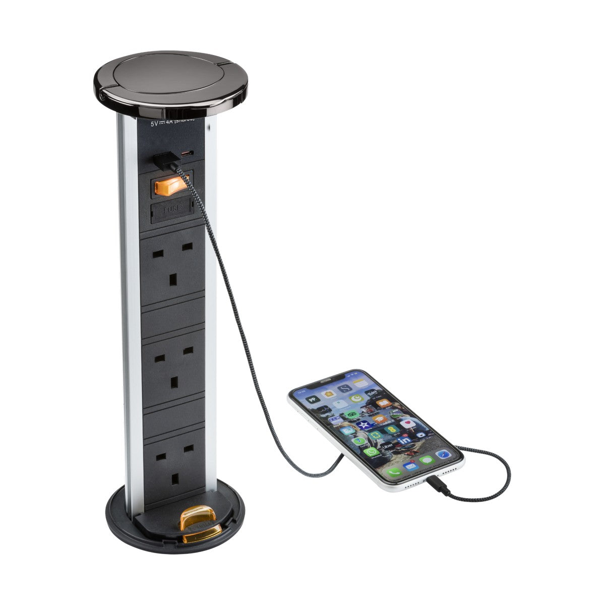 A sleek and modern 3 Gang Pop-Up Socket with USB in Black Nickel sits on the kitchen countertop, featuring multiple electrical outlets and FASTCHARGE USB ports. A smartphone is connected via a USB cable, placed next to this versatile power solution that boasts a stylish circular top.