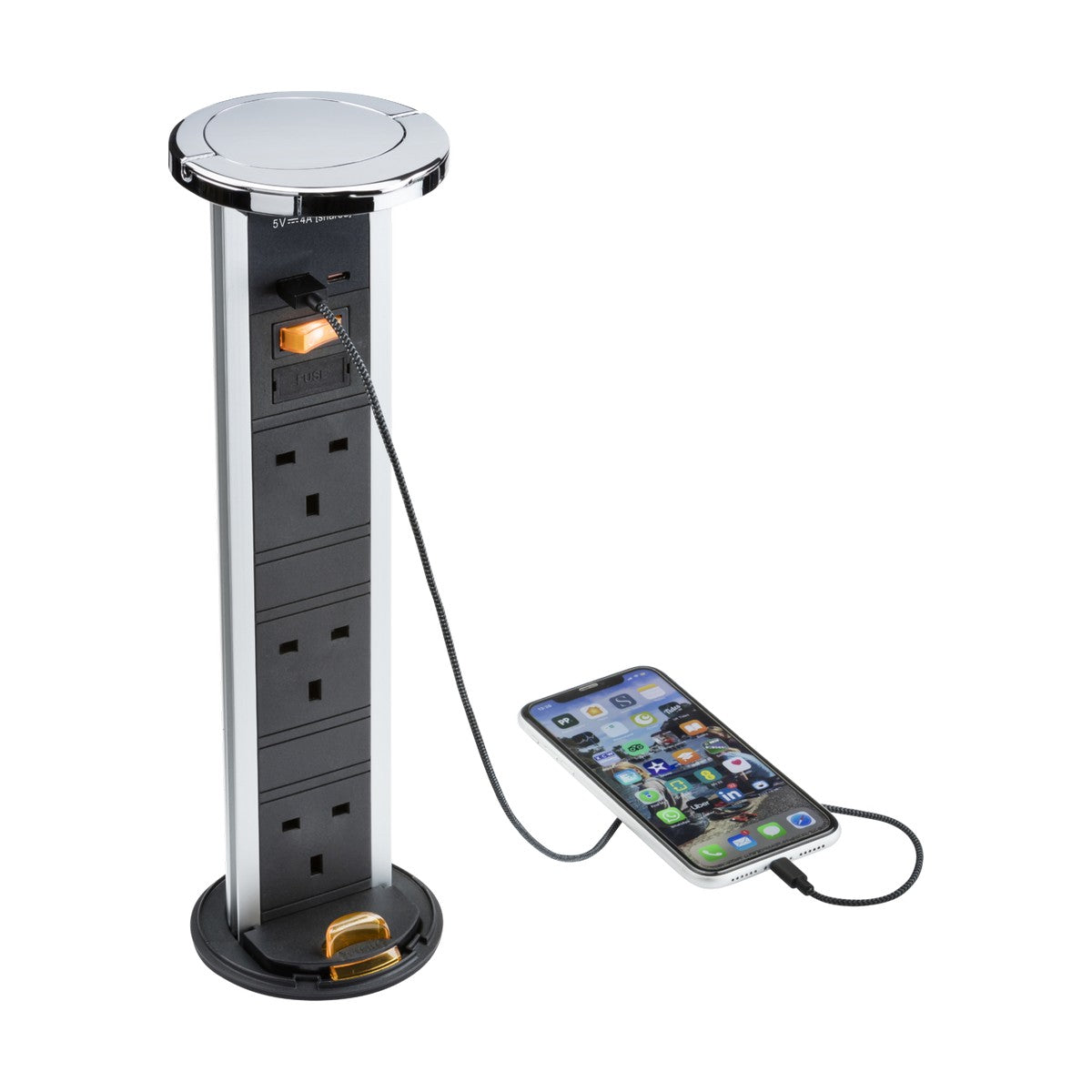 The 3 Gang Pop-Up Socket With USB in a polished chrome finish offers an ideal power solution with its vertical design featuring four outlets and two FASTCHARGE USB ports. A smartphone connected via a black cable charges efficiently on your kitchen countertop, while the socket stylishly extends from its circular base.